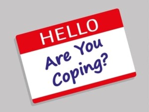 name tag "Hello Are You Coping"